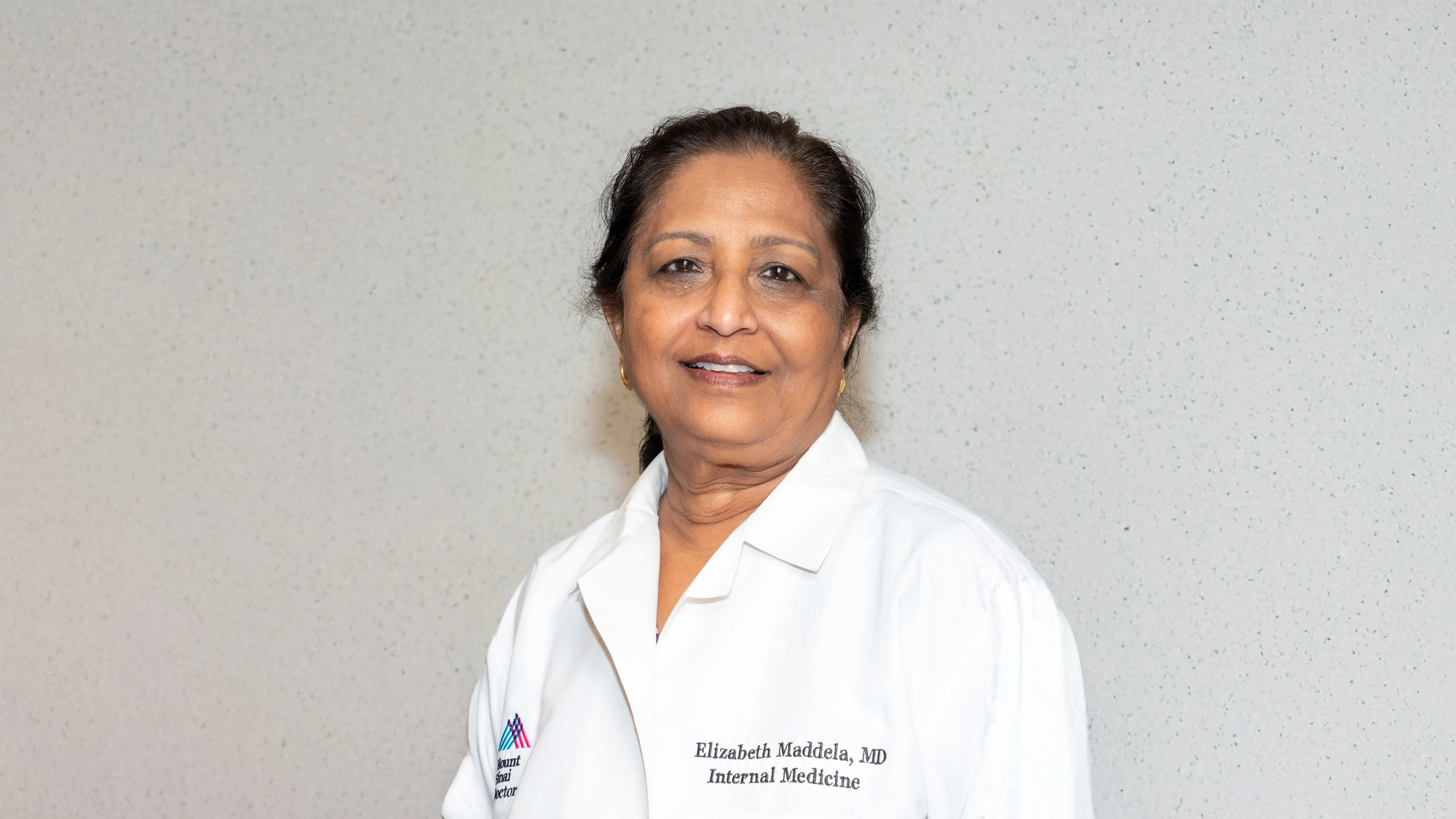 Elizabeth S Maddela