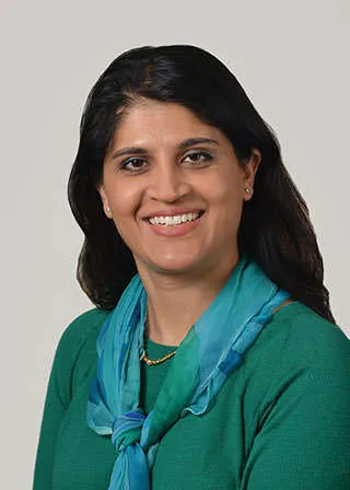 Zainab J Sher