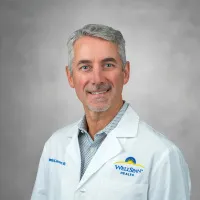 Dennis E Johnson