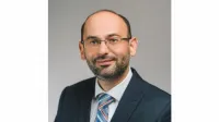 M. Adham Salkeni