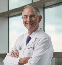 Douglas B Evans