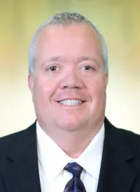 Kevin B Longie