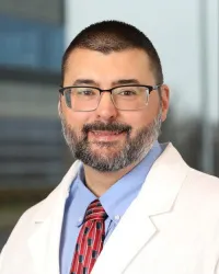 Robert F Battisti