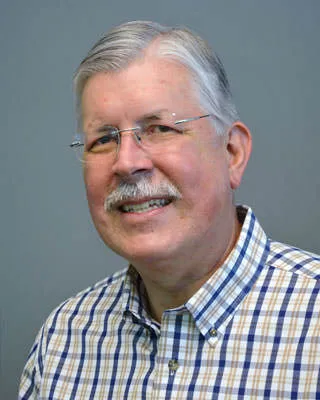 Garry D Tinnes