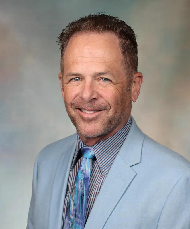 John K Camoriano