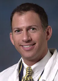 Evan B Koursh