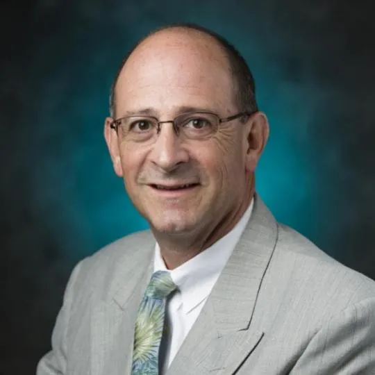 Andrew J Varney