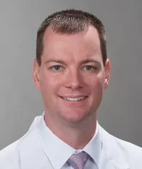 Adrian C Bell