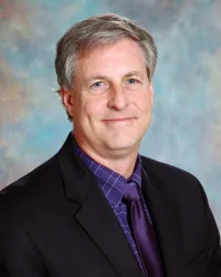 Thomas E. Green