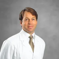 Thomas F Dominick
