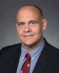 Robert E Geise