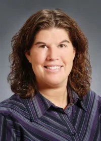 Anne M Lange