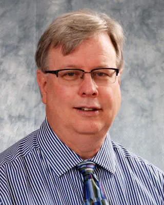Bruce M Graham