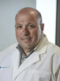 Armand L Minotti