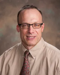 Darren P Corteen