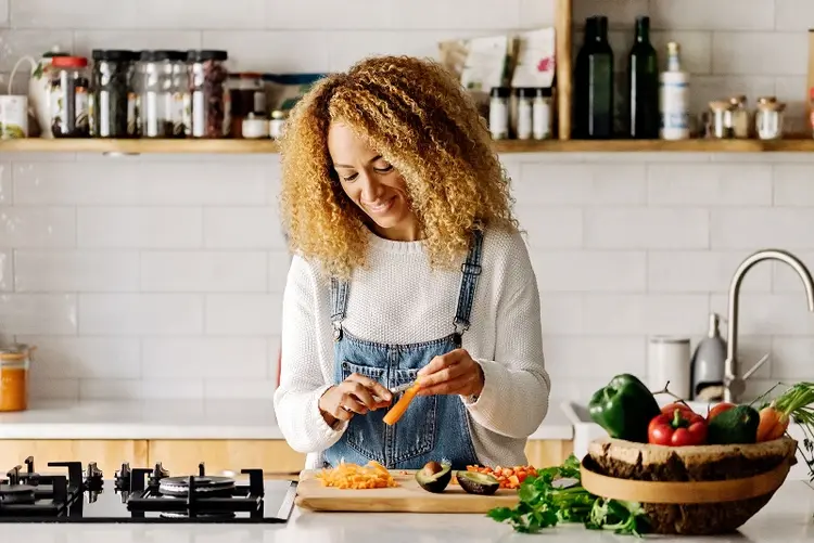 photo of woman cooking at home