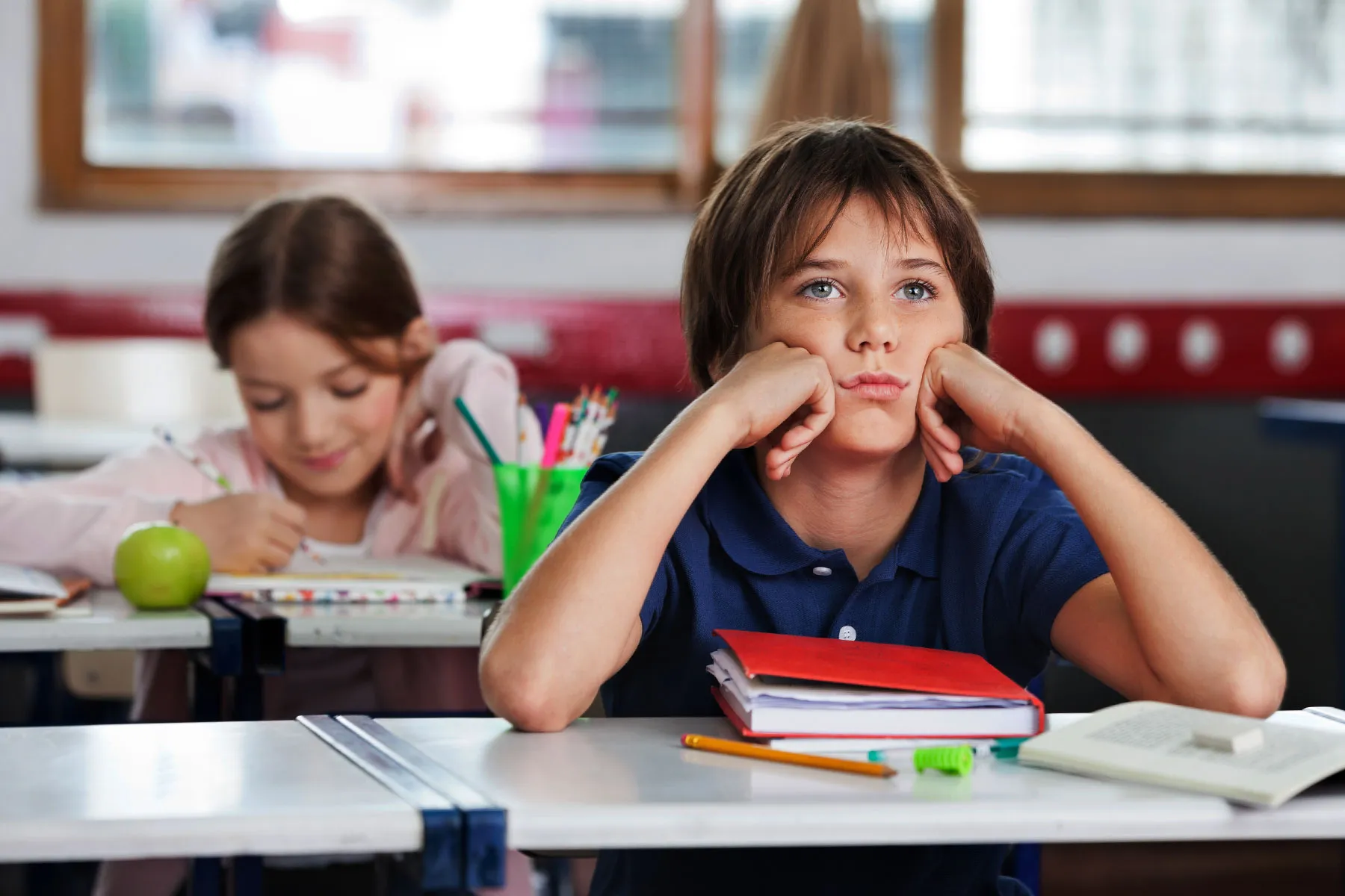 photo of Distracted student in class