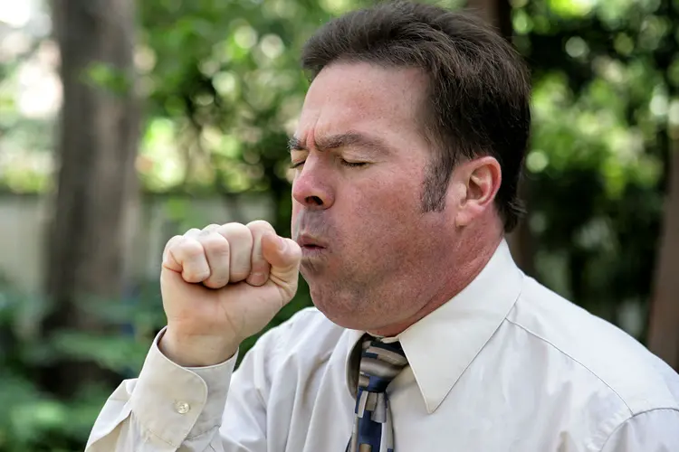 photo of man coughing