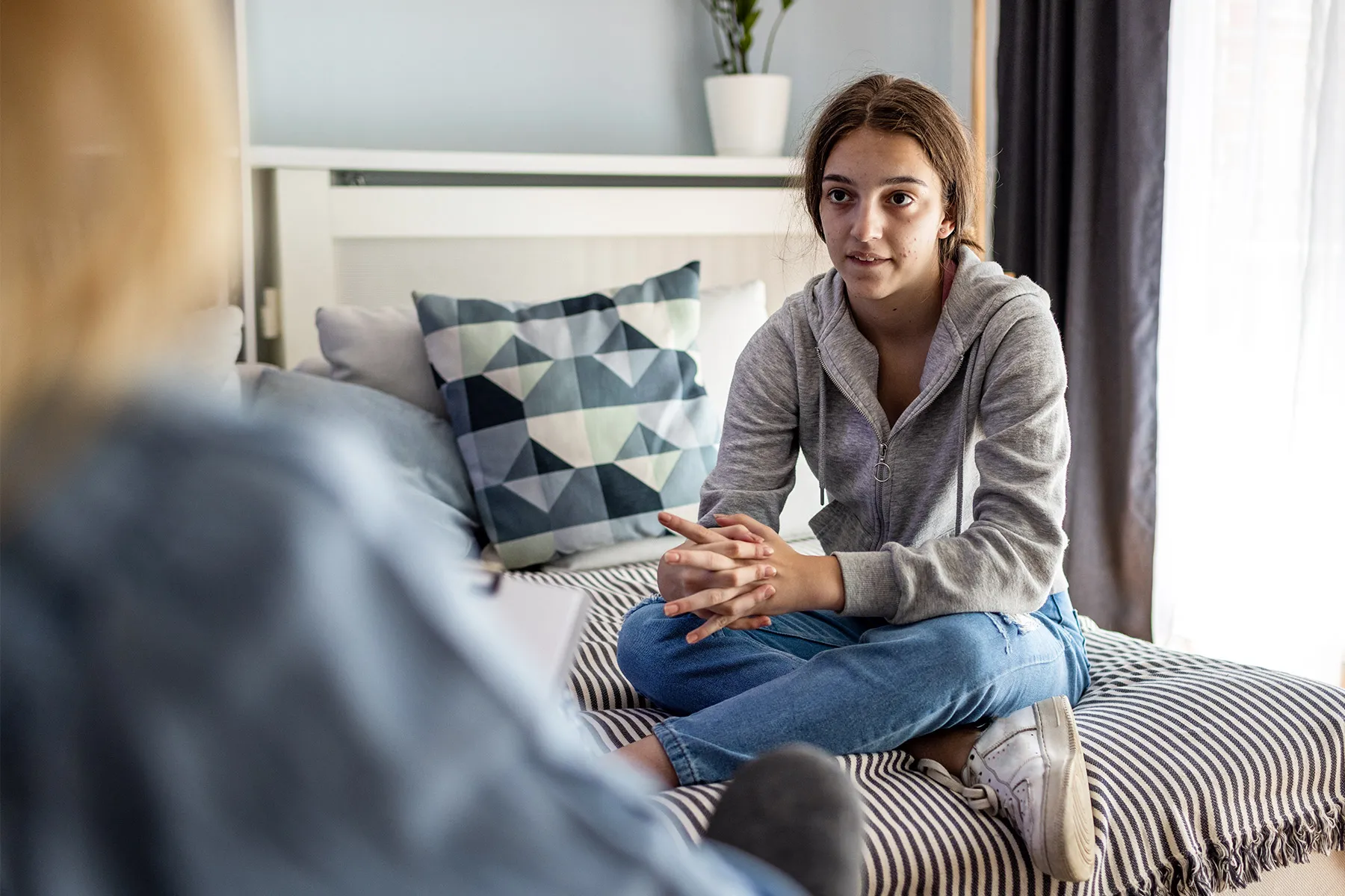 photo of Teenage girl at psychotherapy session 