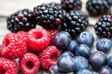 Berries are superfoods because of their high levels of nutrients, including antioxidant vitamin C and polyphenols. (Photo Credit: Westend61/Getty Images)