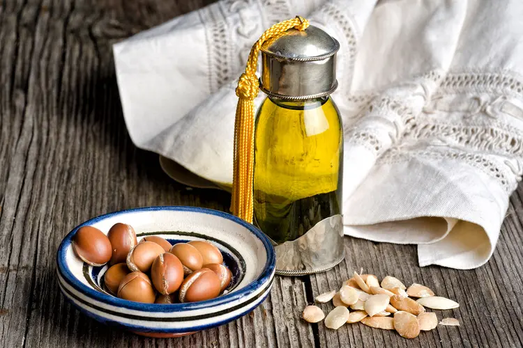 photo of argan oil and argan fruit