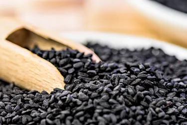 Black seeds come from the Nigella sativa plant. They're used in cooking, but black seed oil is often applied on the body as well as consumed for various health benefits. (Photo Credit: iStock/Getty Images)