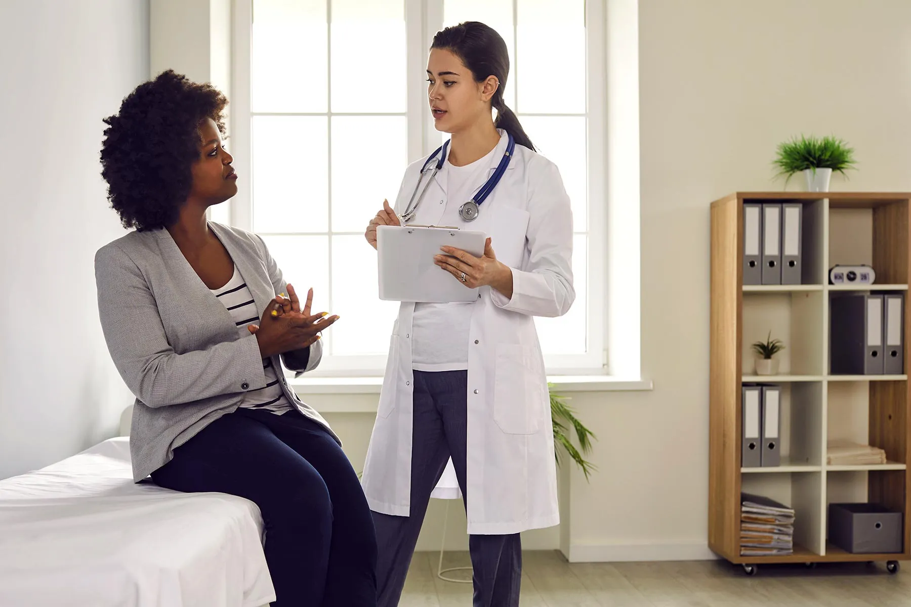 photo of doctor and patient talking
