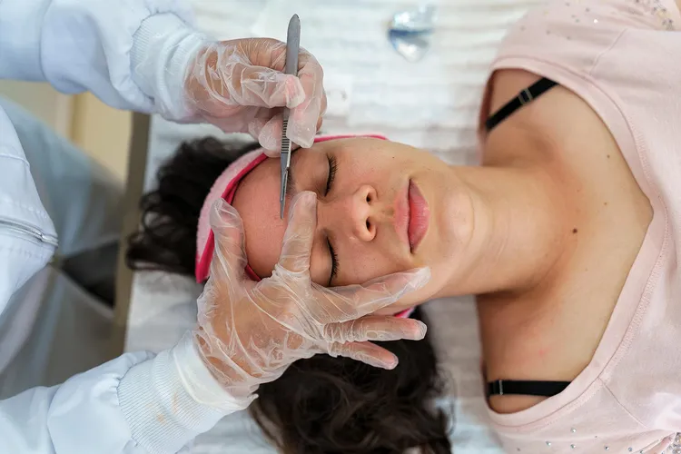 Dermaplaning treatments can help brighten your skin and reduce fine lines. (Photo credit: E+/Getty Images)