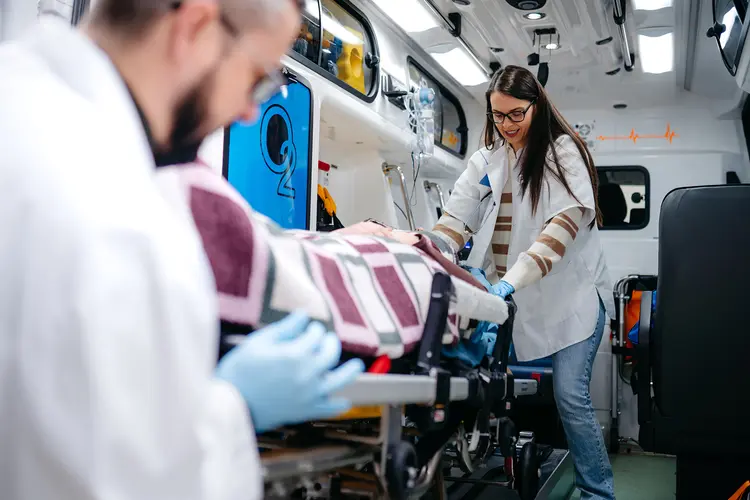 photo of loading patient into ambulance