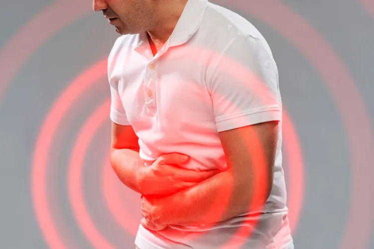 Cramping on the left or right side of your abdomen may be a sign of diverticulitis. (Photo Credit: Syda Productions/Dreamstime)