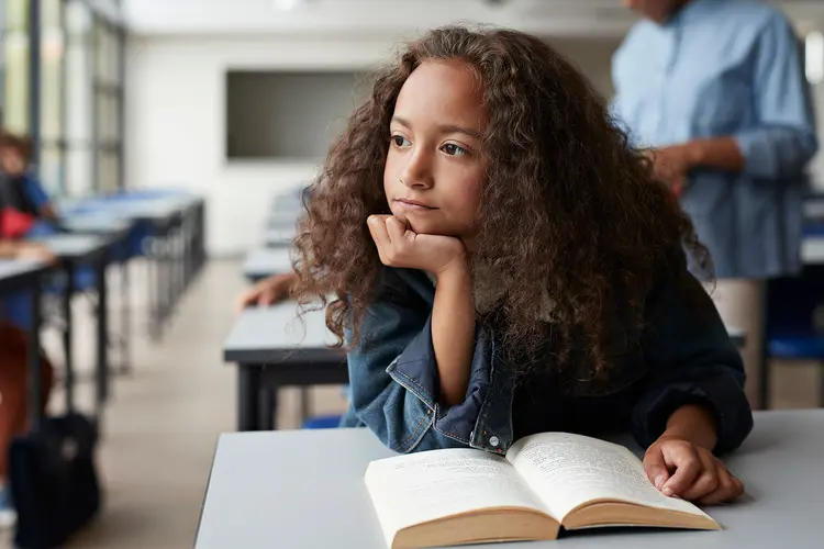 photo of distracted girl at school