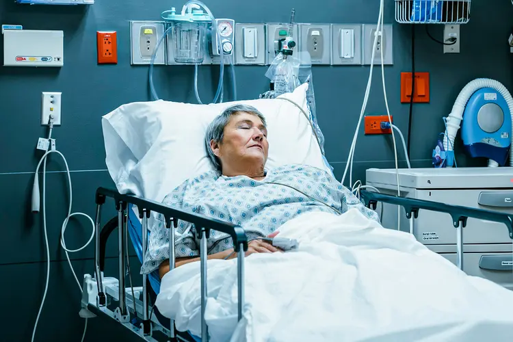 photo of patient sleeping in hospital bed