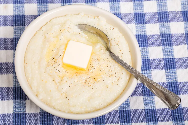 photo of Hot bowl of grits with melting butter