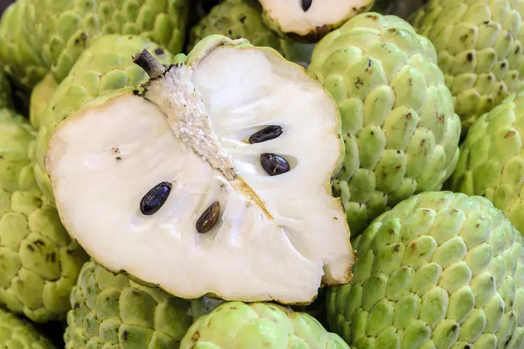 photo of sliced cherimoya fruit 