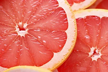 Grapefruits are full of vitamins. One medium grapefruit has 100% of your daily requirement of vitamin C. (Photo Credit: Midjourney)
