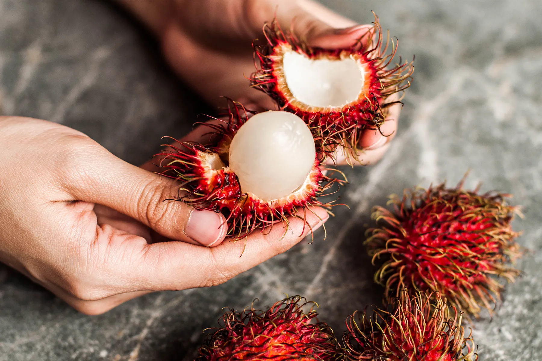 photo of  rambutan on the table