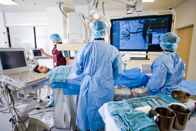 photo of doctor performing angioplasty