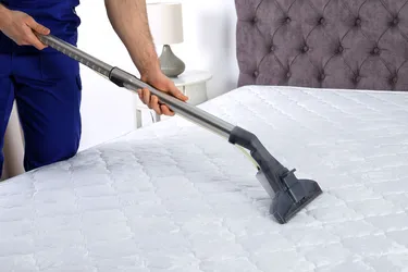 You can help your mattress stay cleaner and last longer by vacuuming it at least a couple of times a year. (Photo Credits: Chernetskaya/Dreamstime)