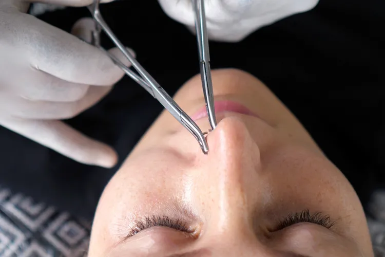 photo of nose piercing procedure