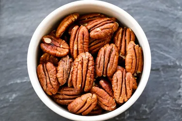 Pecans are packed with vitamins, protein, healthy fats, and fiber. For those able to eat nuts, there are many ways to serve pecans as part of your snacks and meals. (Photo Credit: Moment RF/Getty Images)