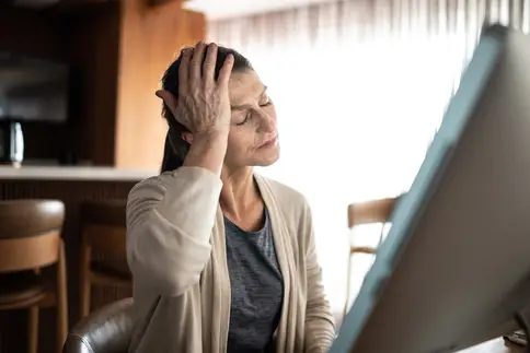 photo of mature woman with headache