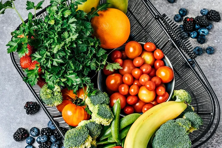 photo of basket of fresh vegetables, and fruits