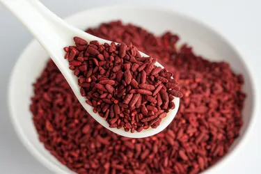 Red yeast rice is a traditional remedy known for its ability to help lower cholesterol, but there are reasons to be cautious about taking red yeast rice extract supplements. (Photo Credit: iStock/Getty Images)