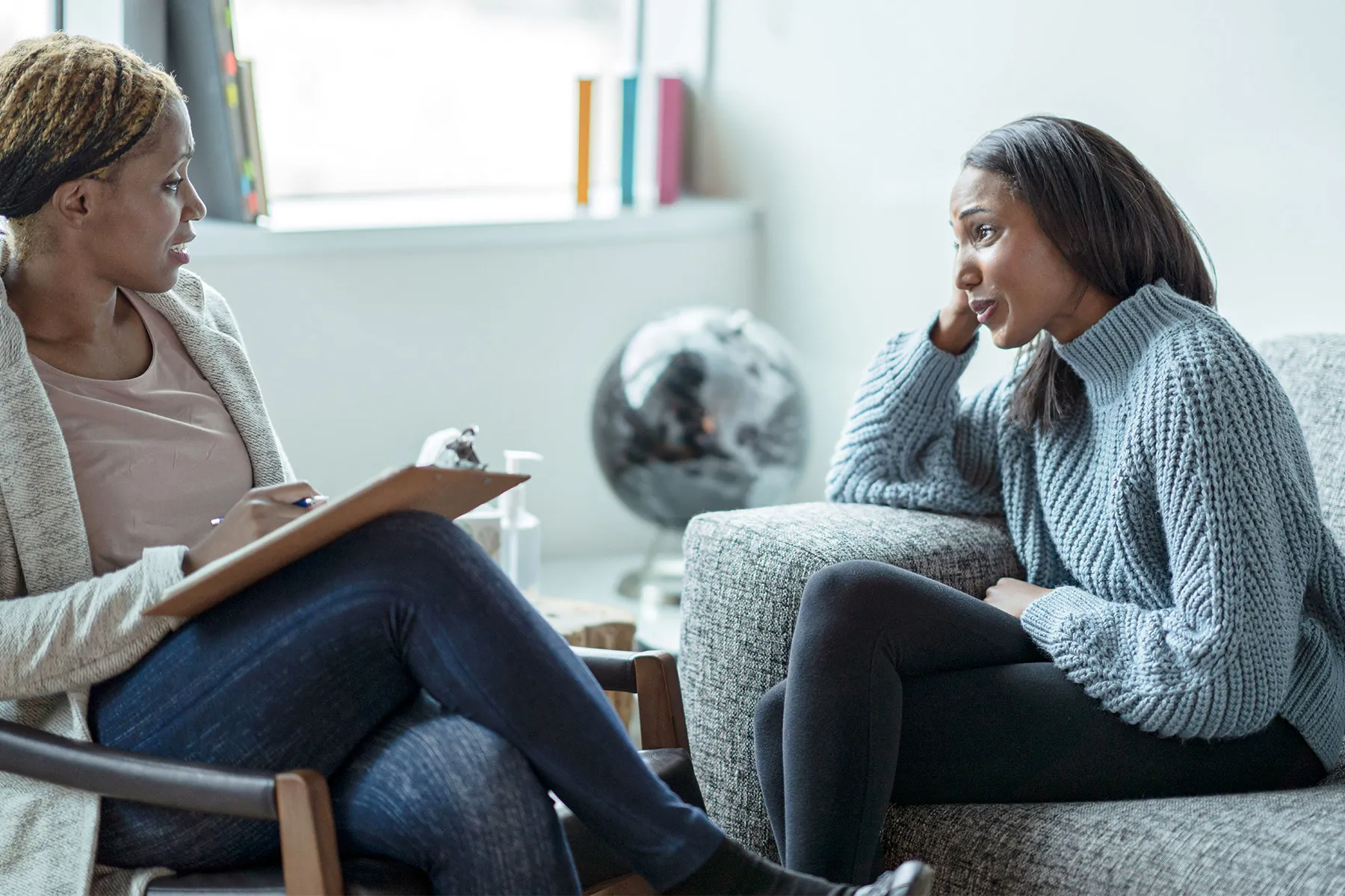 photo of woman talking to therapist