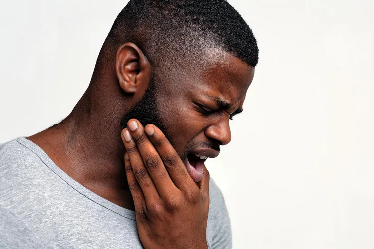 photo of man with jaw/tooth pain