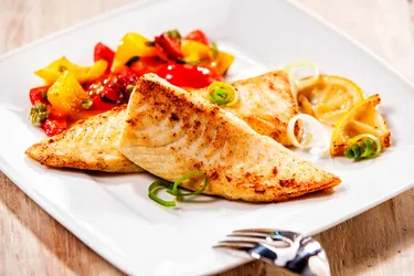 Tilapia is a lean source of protein and provides some omega-3 fatty acids. (Photo Credit: Stockcreations/Dreamstime)