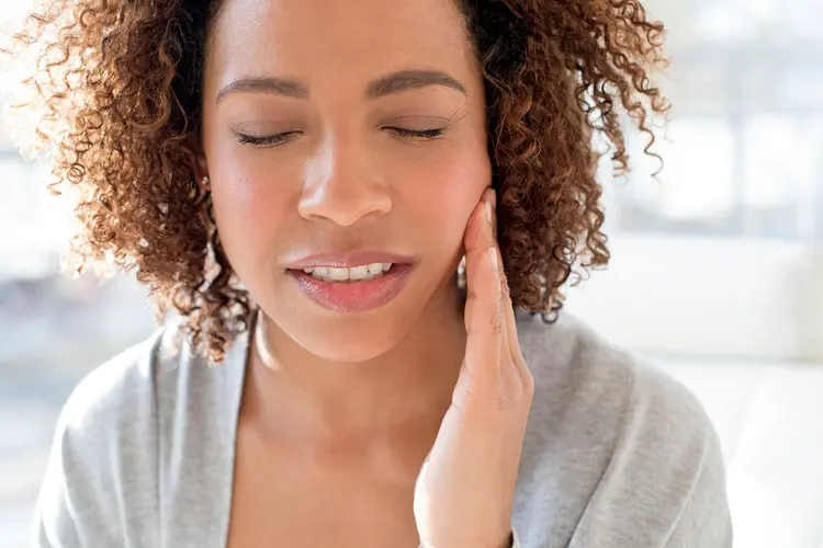 photo of woman with toothache