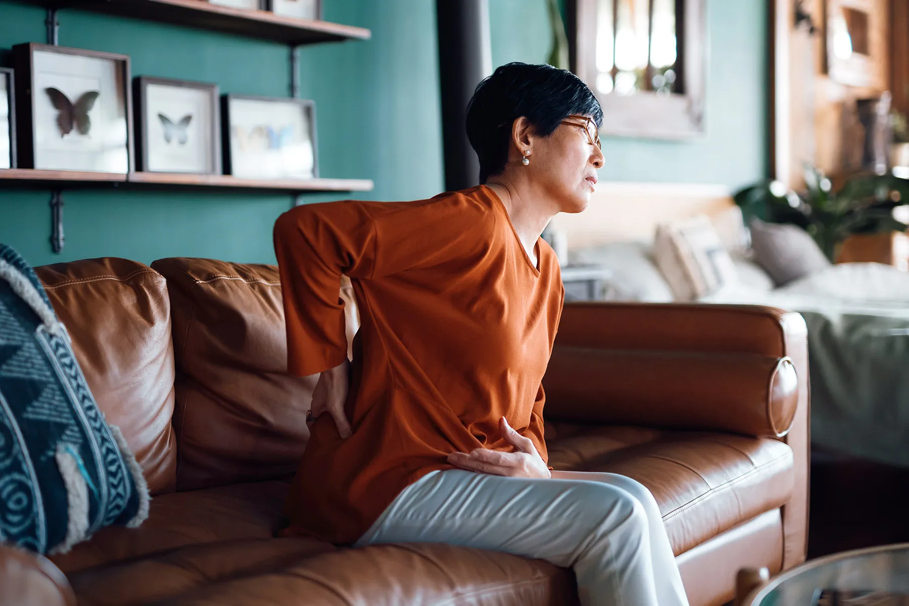 photo of mature woman experiencing back pain