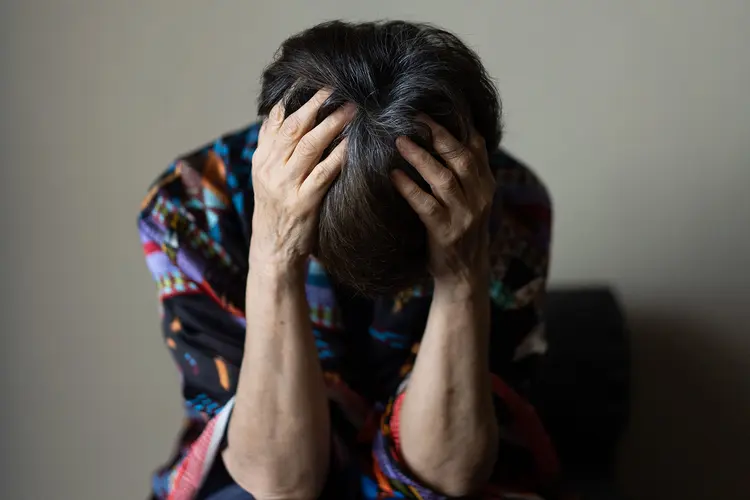 photo of woman with headache
