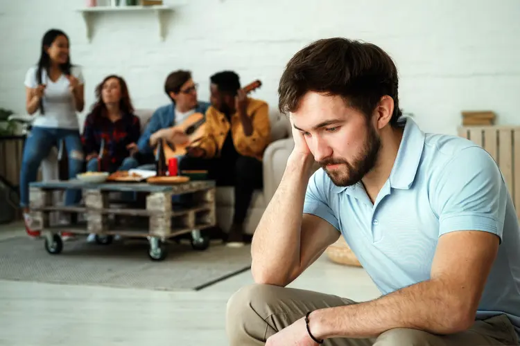 photo of young man feeling socially anxious